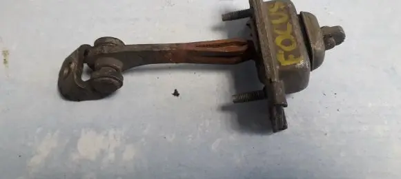 Ford Focus Rear door check strap stopper