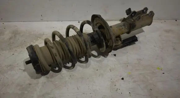 Front shock absorber with coil spring