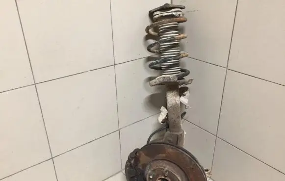 Front wheel hub spindle knuckle