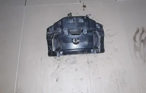 Jaguar XF Front brake caliper L153