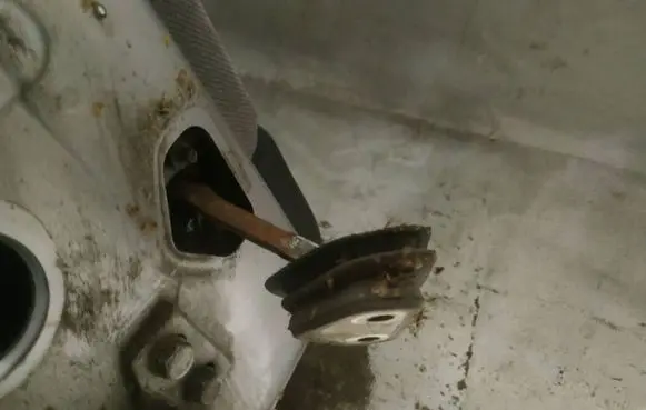 Rear door check strap stopper