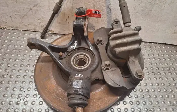 Front wheel hub spindle knuckle