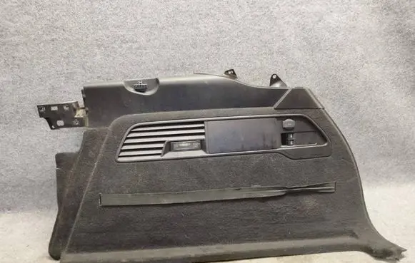 Trunk/boot lower side trim panel
