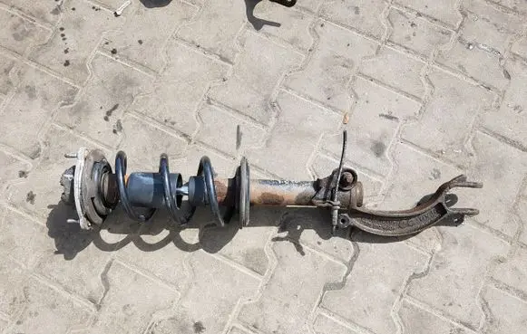Front shock absorber with coil spring