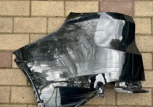 Rear bumper corner part panel trim