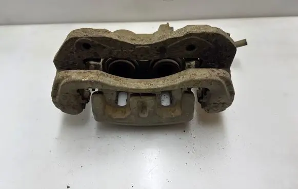 Mitsubishi Pajero Front brake caliper 