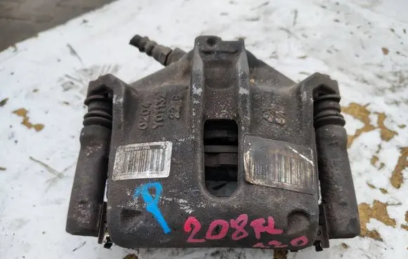 Peugeot 208 I Front brake caliper 