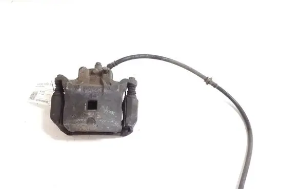 Nissan Juke I F15 Front brake caliper 