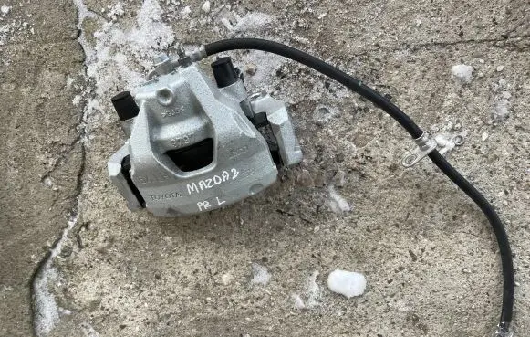 Mazda 2 Front brake caliper 9797 5KLH