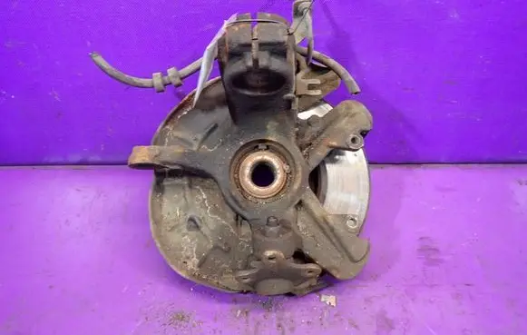 Front wheel hub spindle knuckle