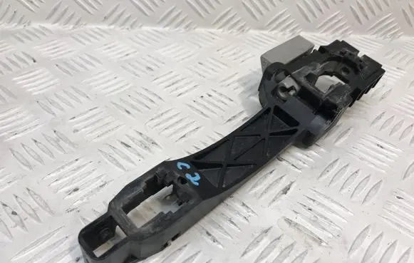 Rear door exterior handle/bracket