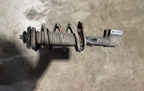 Citroen Berlingo Front shock absorber with coil spring