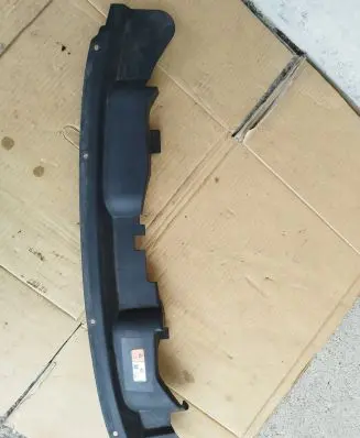 Engine bonnet/hood lock trim molding