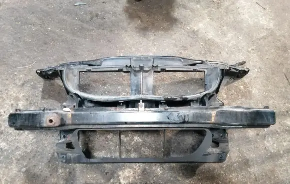Radiator support slam panel bracket