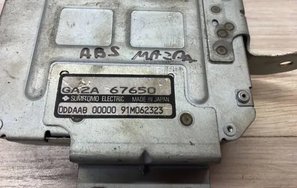 Mazda 626 ABS control unit/module GA2A67650 91M062323