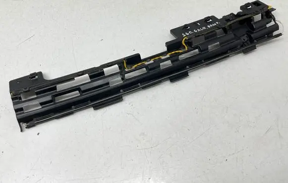Rear bumper trim bar molding