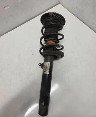 Front shock absorber with coil spring