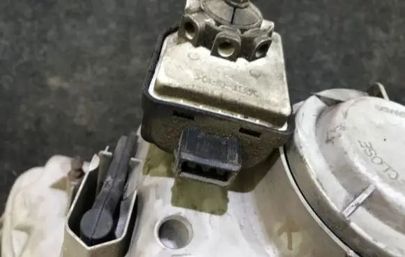 KIA Carens I Headlight level adjustment motor 
