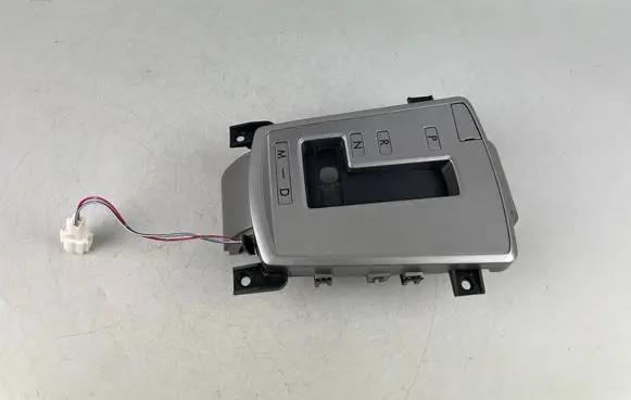 Subaru Legacy Gear shifter surround trim plastic 76E484