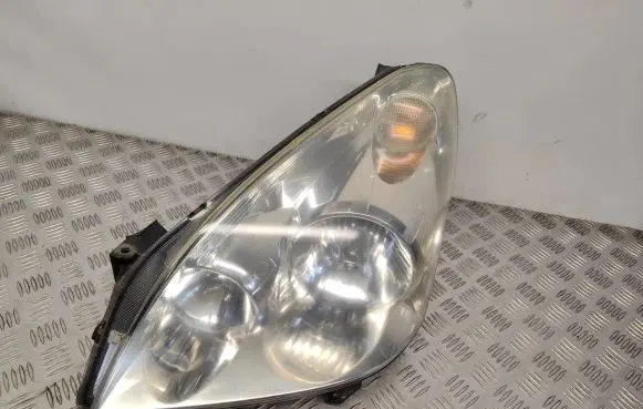 Toyota Corolla Verso AR10 Headlight/headlamp 9073780