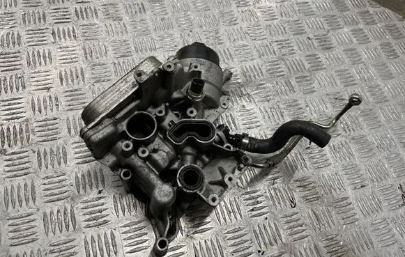 Opel Corsa E Oil filter mounting bracket 55256614