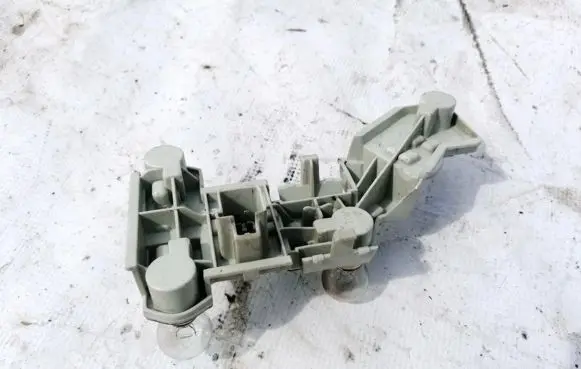 Volvo V50 Tail light bulb cover holder