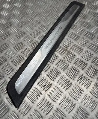 Front sill trim cover