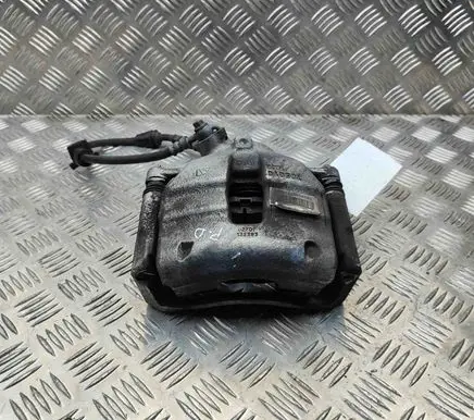 Opel Astra L Front brake caliper 9672297280