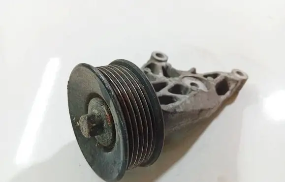 Jaguar XF Generator/alternator belt tensioner 9X238A610AA
