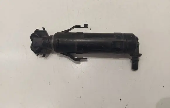 Volkswagen Touran II Headlight washer spray nozzle 1T0955103B