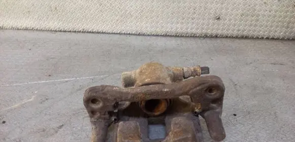 Mitsubishi Lancer VIII Rear brake caliper