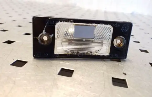 Volkswagen Touareg I Number plate light 1J5943021D