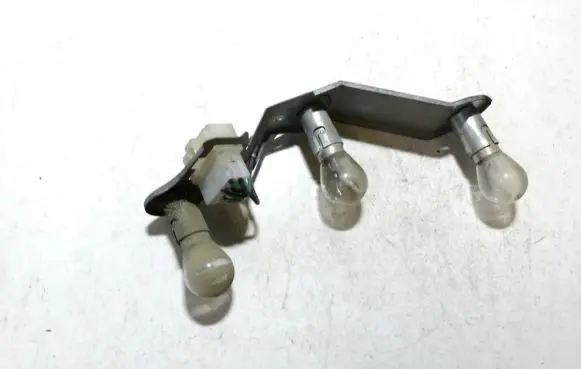 Mitsubishi Lancer Tail light bulb cover holder