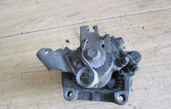 Opel Astra H Brake caliper pad carrier rear