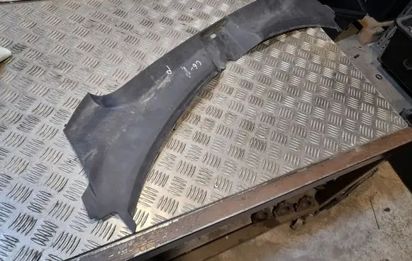 Engine bonnet/hood lock trim molding