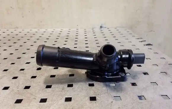 Thermostat/thermostat housing