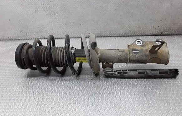 Front shock absorber with coil spring