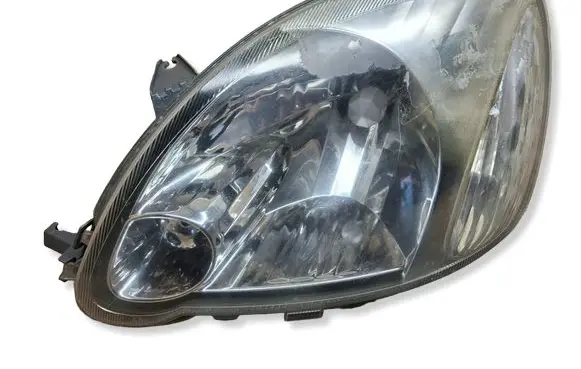 Toyota Yaris Headlight/headlamp 811500D08000 89007614