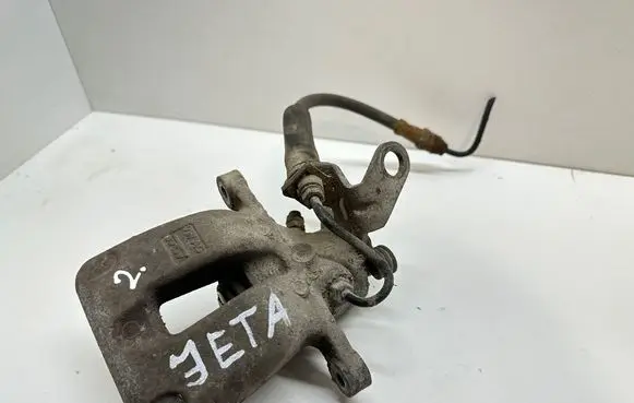 Volkswagen Jetta V Rear brake caliper