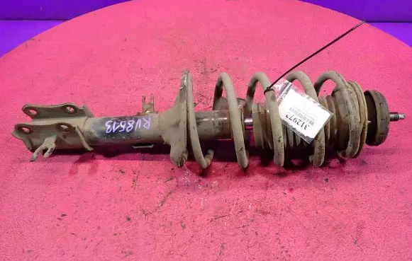 Chevrolet Kalos Front shock absorber with coil spring