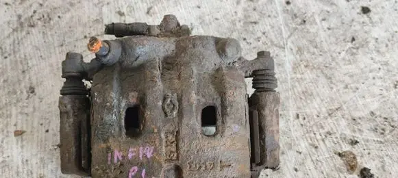 Infiniti QX4 Front brake caliper 410110W701