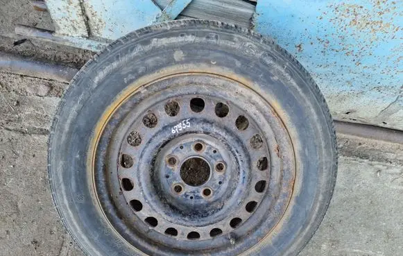 Mercedes-Benz E W124 R15 spare wheel 1244001202