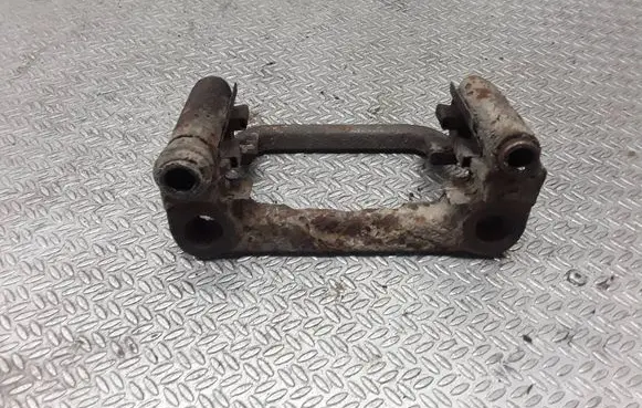 Nissan X-Trail T30 Brake caliper pad carrier rear 