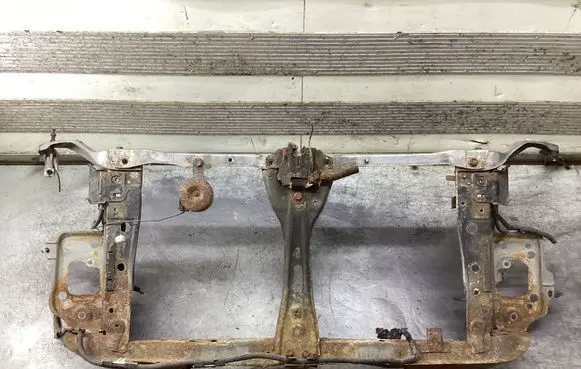 Radiator support slam panel bracket