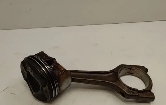 Piston with connecting rod