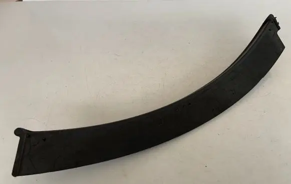 Rear bumper trim bar molding