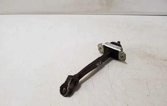 Front door check strap stopper