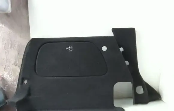 Trunk/boot lower side trim panel