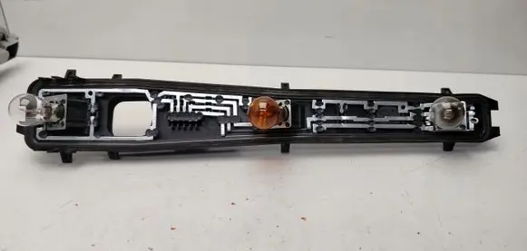 Ford Fusion Tail light bulb cover holder 2S6113N004AD