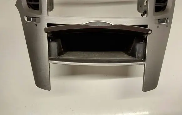 Subaru Outback Radio/GPS head unit trim 66120AJ020